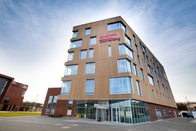 Image of the AWRC building against a blue sky