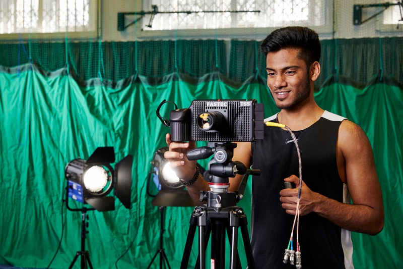 image of a person using recording equipment in sports gear