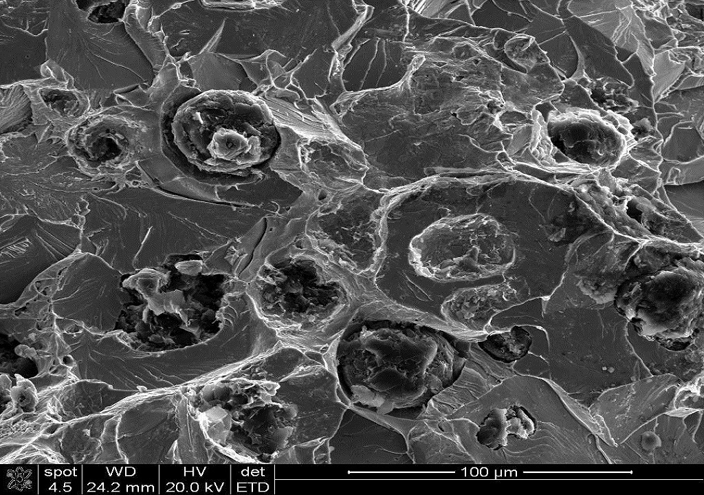 SEM image of a brittle overload fracture in a Spheroidal Graphite Cast Iron component.