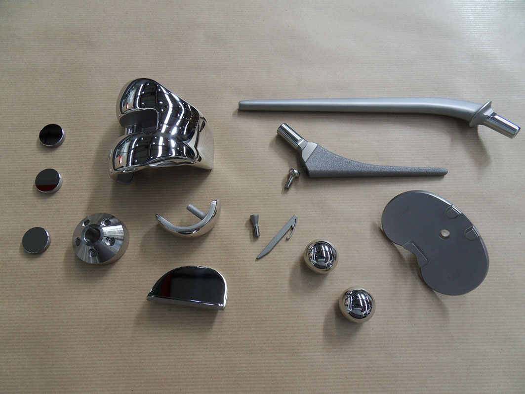 implant components for hip- and knee implants after coating