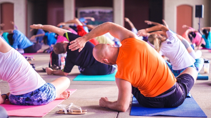 People taking part in a yoga class