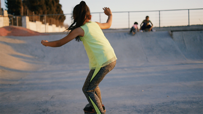 Girl skateboarding at a park in Asira Al-Shamaliya, Palestine