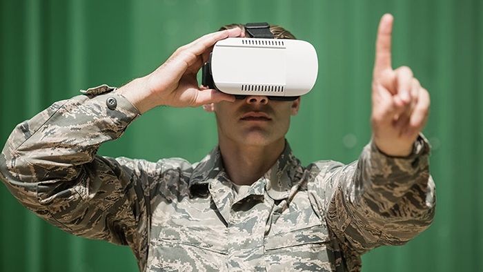 A soldier training on VR equipment