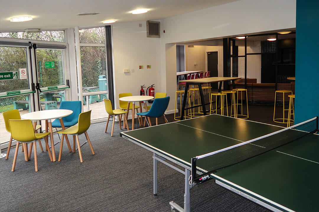 Common room with pool table, ping pong, games console and dartboard