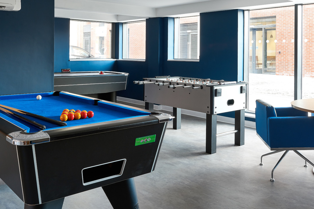 Common room with pool and table football