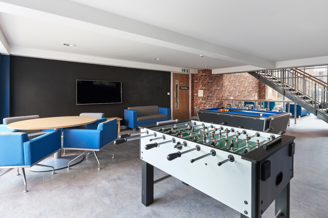 Common Room with pool table, ping pong table and TV