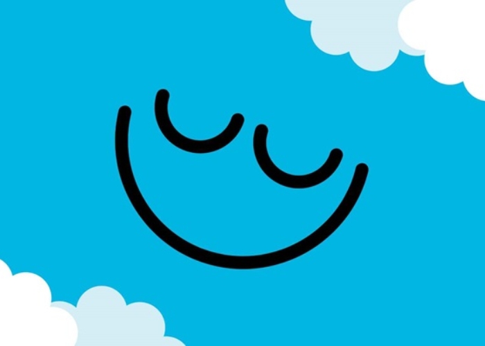 Bright blue background with a smiley face in the middle and white clouds round the edge