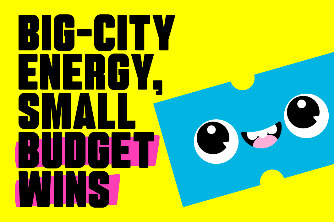 Bright yellow background with 'big-city energy, small budget wins' written over the top