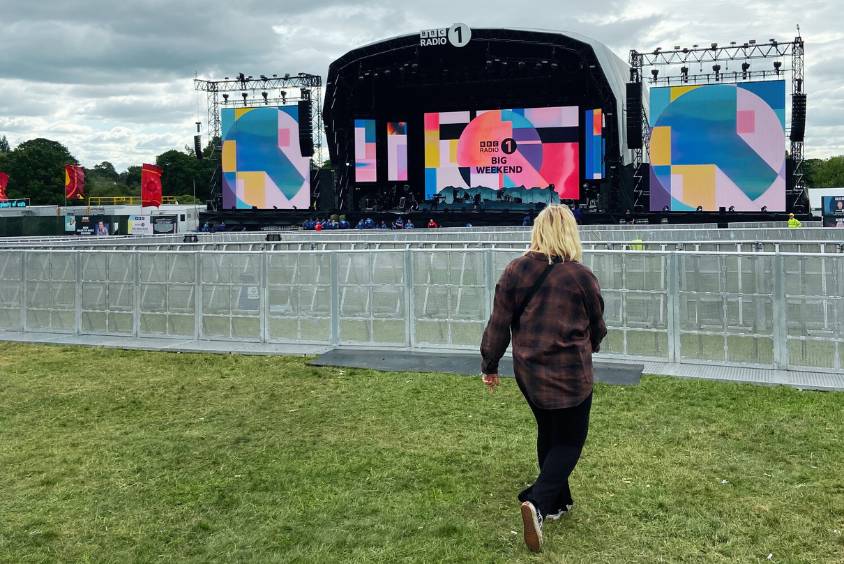 Emilie Ward working at a festival