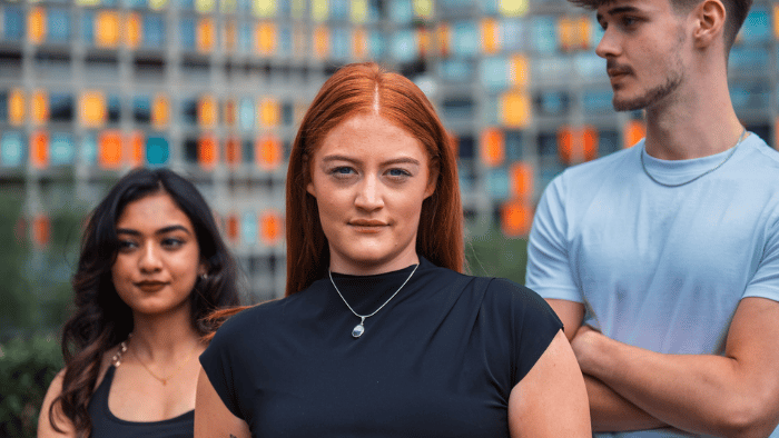 Three Sheffield Hallam students at Park Hill, Sheffield.