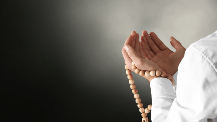 Picture of hands holding prayer beads