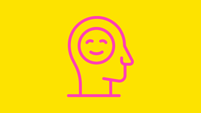 Icon of a head with a smiley face in it