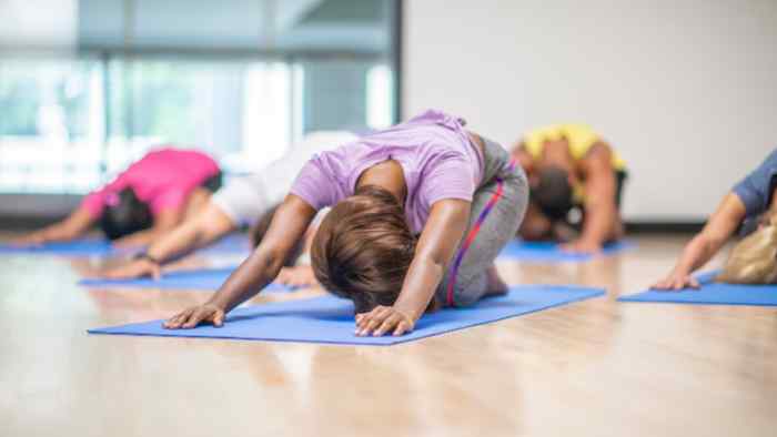 An image of people practicing yoga