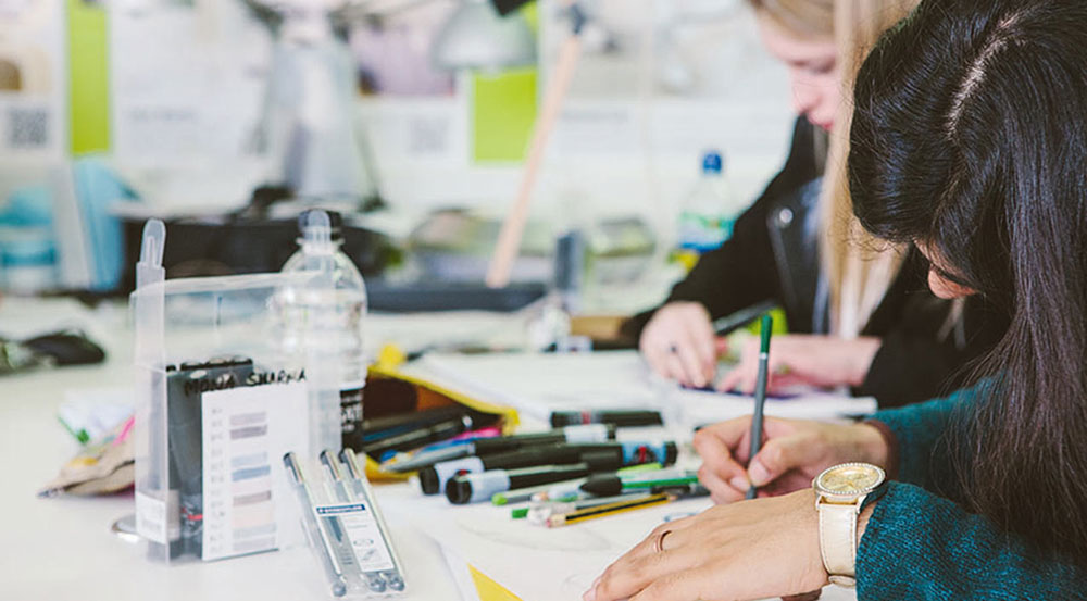 Students filling in an application form