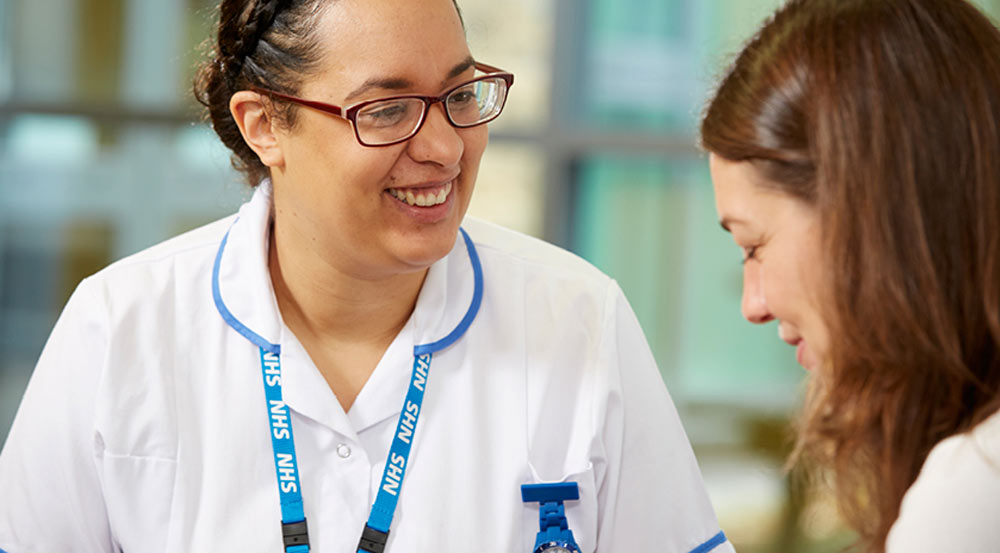 Two nurses smiling