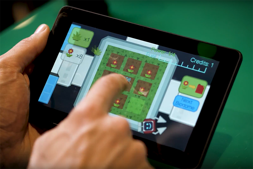 User playing a maths game on a tablet